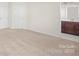 Spacious bedroom with plush carpeting and an ensuite bathroom at 1304 Queen Lyon Ct, Charlotte, NC 28205