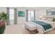Bright bedroom with king-size bed and balcony access at 1304 Queen Lyon Ct, Charlotte, NC 28205