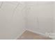 Walk-in closet with wire shelving for storage at 1304 Queen Lyon Ct, Charlotte, NC 28205