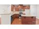 Modern kitchen with granite island and stainless steel appliances at 1304 Queen Lyon Ct, Charlotte, NC 28205