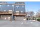 Attached garages and private decks of townhome community at 1304 Queen Lyon Ct, Charlotte, NC 28205