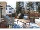 Spacious deck features wicker furniture and a grill, perfect for entertaining at 13836 Ballantyne Meadows Dr, Charlotte, NC 28277