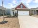 Two-story home exterior with brick and siding, attached garage, and landscaping at 1417 Turkey Roost Rd # 69, Fort Mill, SC 29715
