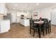Modern kitchen with white cabinets, stainless steel appliances, and an island at 1417 Turkey Roost Rd # 69, Fort Mill, SC 29715