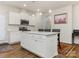 Modern kitchen with white cabinets, stainless steel appliances, and an island at 1417 Turkey Roost Rd # 69, Fort Mill, SC 29715