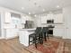 Modern kitchen with white cabinets, stainless steel appliances, and an island at 1417 Turkey Roost Rd # 69, Fort Mill, SC 29715