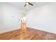 Bright, spacious bedroom with hardwood floors, ceiling fan and view of kitchen at 15927 Vale Ridge Dr, Charlotte, NC 28278