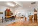 Open concept dining area with hardwood floors and large windows at 15927 Vale Ridge Dr, Charlotte, NC 28278