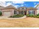 Charming brick home featuring a manicured lawn, well-placed shrubbery, and a two-car garage at 15927 Vale Ridge Dr, Charlotte, NC 28278