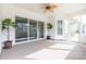 Covered patio with concrete floors, ceiling fan, and sliding glass doors at 15927 Vale Ridge Dr, Charlotte, NC 28278