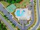 Bird's eye view of the sparkling community pool, with tennis courts and parking at 15927 Vale Ridge Dr, Charlotte, NC 28278