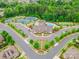 Aerial shot of community amenities, including tennis courts and a sparkling swimming pool at 15927 Vale Ridge Dr, Charlotte, NC 28278