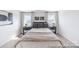 Comfortable bedroom with neutral decor, a cozy bed, and bedside tables at 205 Cliffwood Nw St # B-2, Concord, NC 28027