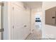 Hallway featuring closet and view of bedroom at 205 Cliffwood Nw St # B-2, Concord, NC 28027