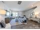 Spacious living room with hardwood floors, comfortable seating, and modern decor at 205 Cliffwood Nw St # B-2, Concord, NC 28027