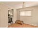 Bright dining room with wood floors and kitchen access at 2101 Englewood St, Kannapolis, NC 28083