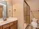 Bathroom with vanity, shower, and toilet at 2321 Herrons Nest Nw Pl, Concord, NC 28027