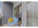 Private balcony with seating and city views at 3630 N Davidson St # 2210, Charlotte, NC 28205