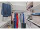 Walk-in closet with ample shelving and hanging space at 3630 N Davidson St # 2210, Charlotte, NC 28205