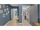 Hallway with a bench, closet, and additional doors at 3630 N Davidson St # 2210, Charlotte, NC 28205