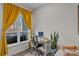 Bright home office features a standing desk and a view of the balcony at 3630 N Davidson St # 2210, Charlotte, NC 28205