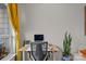 Home office with standing desk, window, and view of city at 3630 N Davidson St # 2210, Charlotte, NC 28205