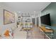Open concept living room with sectional sofa and access to balcony at 3630 N Davidson St # 2210, Charlotte, NC 28205