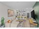 Open concept living room with sectional sofa, large TV, and stylish decor at 3630 N Davidson St # 2210, Charlotte, NC 28205