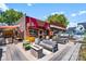 Outdoor patio area with fire pit and seating at 3630 N Davidson St # 2210, Charlotte, NC 28205