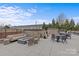 Outdoor patio with seating, fire pit, and tables at 3630 N Davidson St # 2210, Charlotte, NC 28205