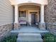 Inviting front porch with stone columns and comfortable seating at 4005 Brandywine Ter, Lancaster, SC 29720