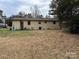 View of the back of the house and yard at 520 Moore St, Wadesboro, NC 28170