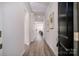 Bright foyer with hardwood floors leading to the living areas at 6420 Barcelona Way, Charlotte, NC 28214