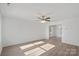 Bright living room with hardwood floors and neutral walls at 815 Sherwood Ave, Albemarle, NC 28001