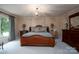 Main bedroom with a large bed and chandelier at 825 W Ketchie St, China Grove, NC 28023