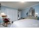 Bedroom with a large closet and rocking chair at 825 W Ketchie St, China Grove, NC 28023