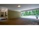 Covered carport with access to backyard, providing convenient parking at 825 W Ketchie St, China Grove, NC 28023