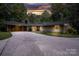 Ranch style home with carport and landscaping, offering curb appeal at 825 W Ketchie St, China Grove, NC 28023