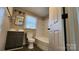 Updated bathroom with dark vanity and bathtub at 832 Richard Ave, Kannapolis, NC 28081