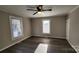 Spacious bedroom with hardwood floors and ceiling fan at 832 Richard Ave, Kannapolis, NC 28081