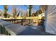 Small deck overlooking the backyard with a gate at 832 Richard Ave, Kannapolis, NC 28081