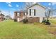 Rear view of house, showing brick and siding at 916 Church St, Kings Mountain, NC 28086