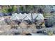 Aerial view showcasing a condo building near a lake at 921 Northeast Dr, Davidson, NC 28036