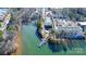 Aerial view showing property location on the lake with a dock at 921 Northeast Dr, Davidson, NC 28036