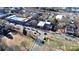 Aerial view of charming town with shops and tree-lined streets at 921 Northeast Dr, Davidson, NC 28036