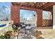 Cozy balcony with brick details and outdoor seating at 921 Northeast Dr, Davidson, NC 28036