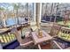 Private balcony overlooking a peaceful lake and wooded area at 921 Northeast Dr, Davidson, NC 28036