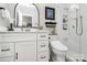 Elegant bathroom with white shaker cabinets, a soaking tub and a walk-in shower at 921 Northeast Dr, Davidson, NC 28036