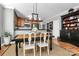 Elegant dining area, hardwood floors, and a charming built-in hutch at 921 Northeast Dr, Davidson, NC 28036