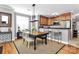 Bright dining area with hardwood floors and a view into the kitchen at 921 Northeast Dr, Davidson, NC 28036